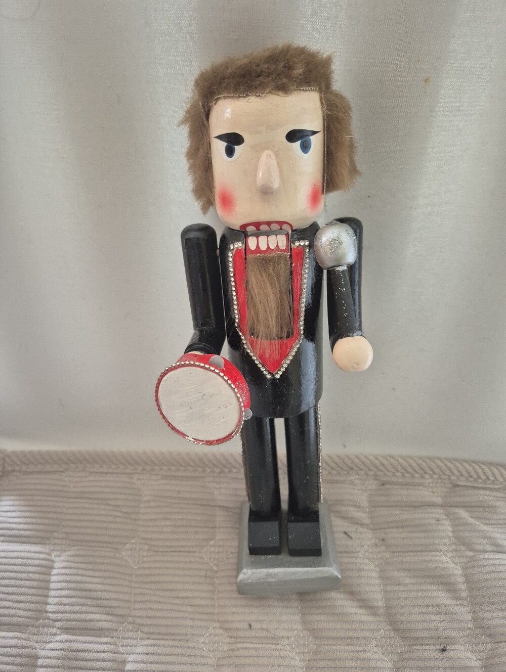 Wooden Nutcracker with Red Tambourine and Microphone